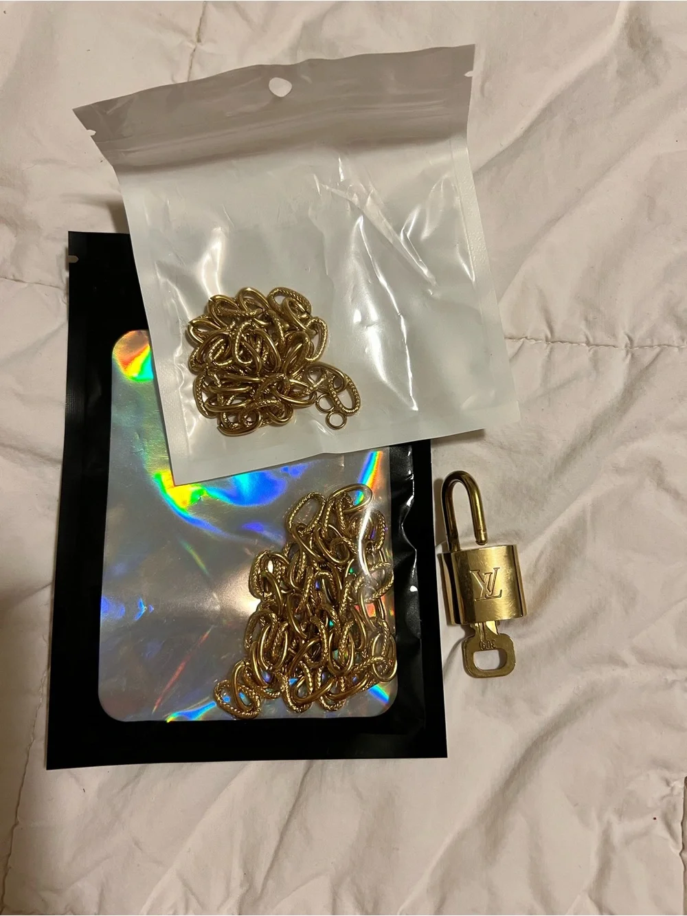 Louis Vuitton Gold Padlock and Key with LV Monogram